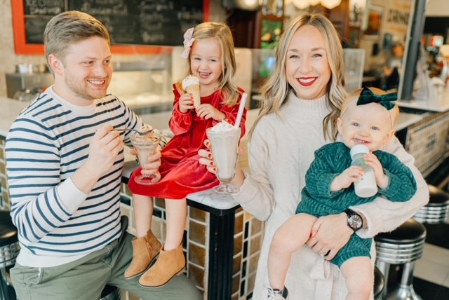 A photo of PLC Alumna, Morgan Brammer, with her husband and two children eating ice cream treats smiling. 