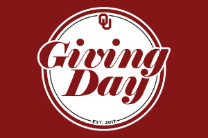 Giving Day written in crimson lettering