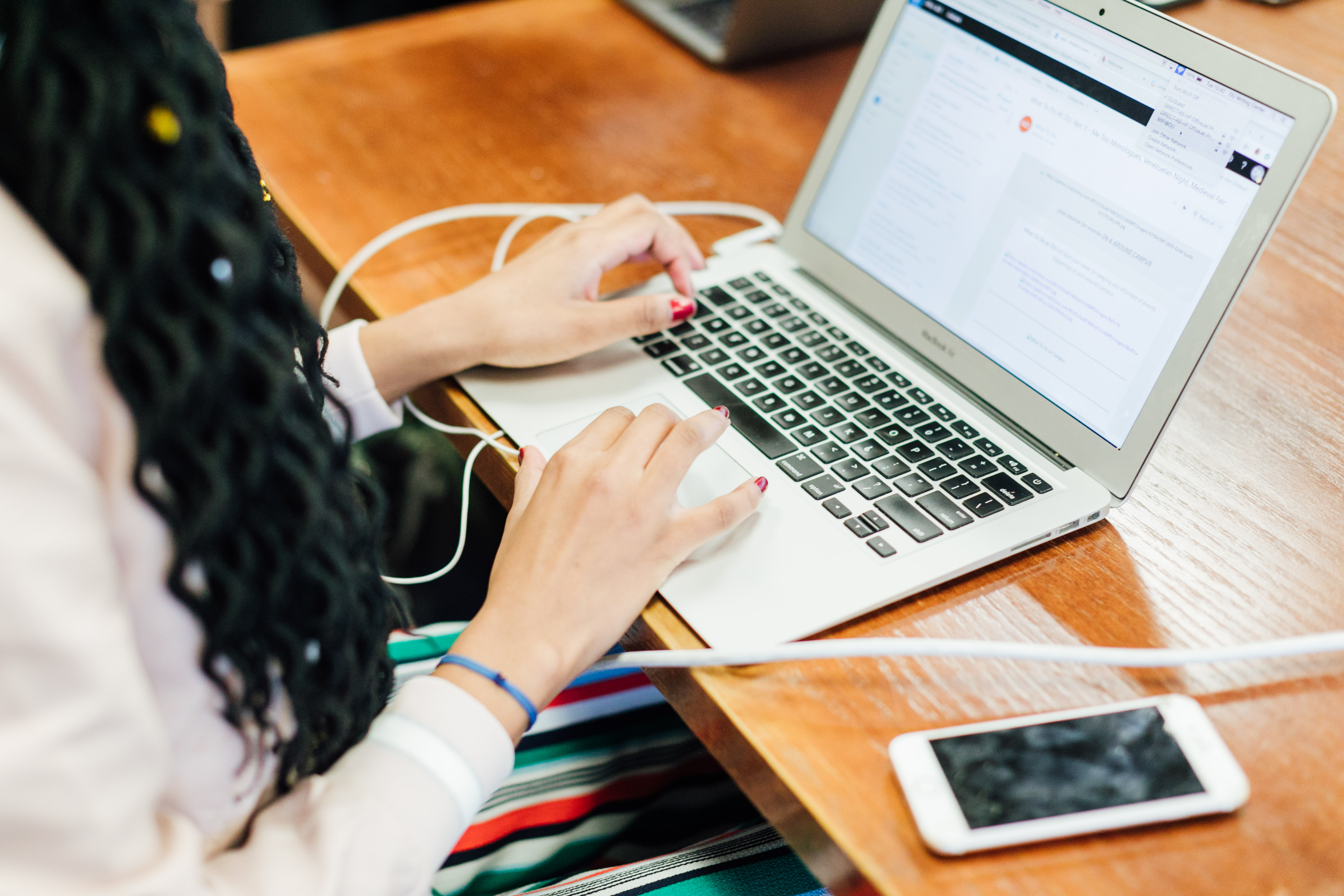A woman sitting at a simulator.