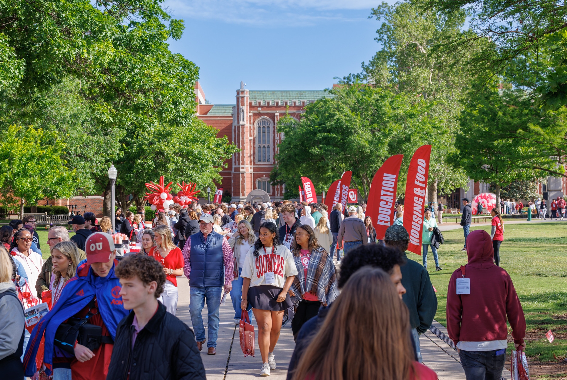 Students walking on the South Oval through Sooner Saturday