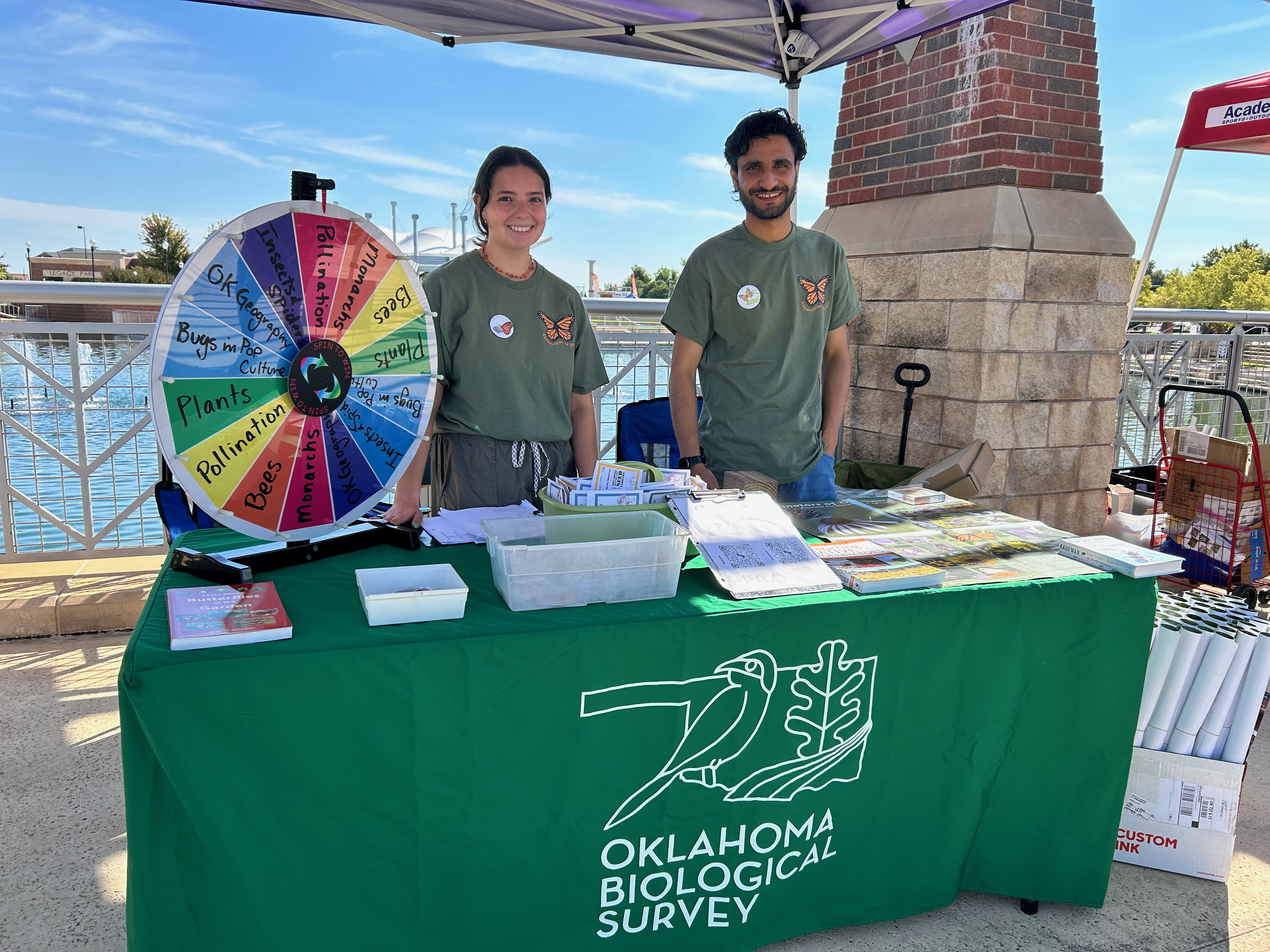 Students at our outreach table at the Norman Monarchs in the Park Event