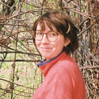 Katelynn in a tree tunnel