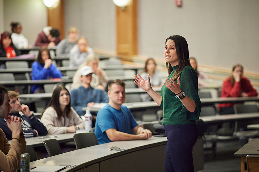 a teacher is talking in a classroom