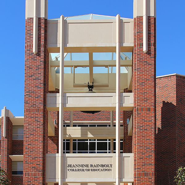 picture of the front of Collings Hall showing the bell tower