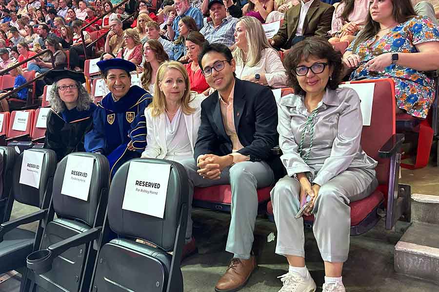 Family of Diego Dorantes Sanchez seated with Consul Pineda of Mexico, Dr. Victor Maqque, and Dr. Claire Nicholas at the 2026 commencement ceremony.