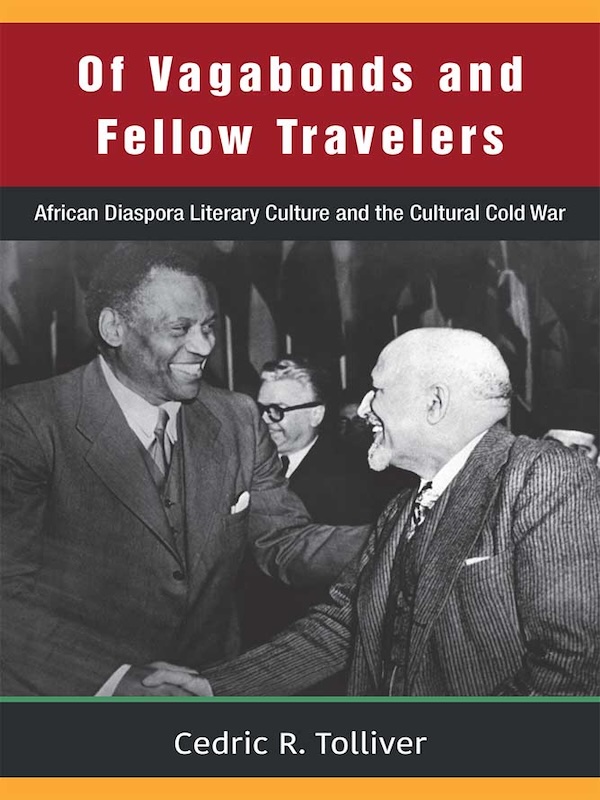 Book cover of Of Vagabons and Fellow Travelers by Cedric R. Tolliver. Features a black and white photo of two men shaking hands.