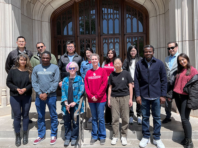 SLIS PhD students and faculty in front of Bizzell Library.