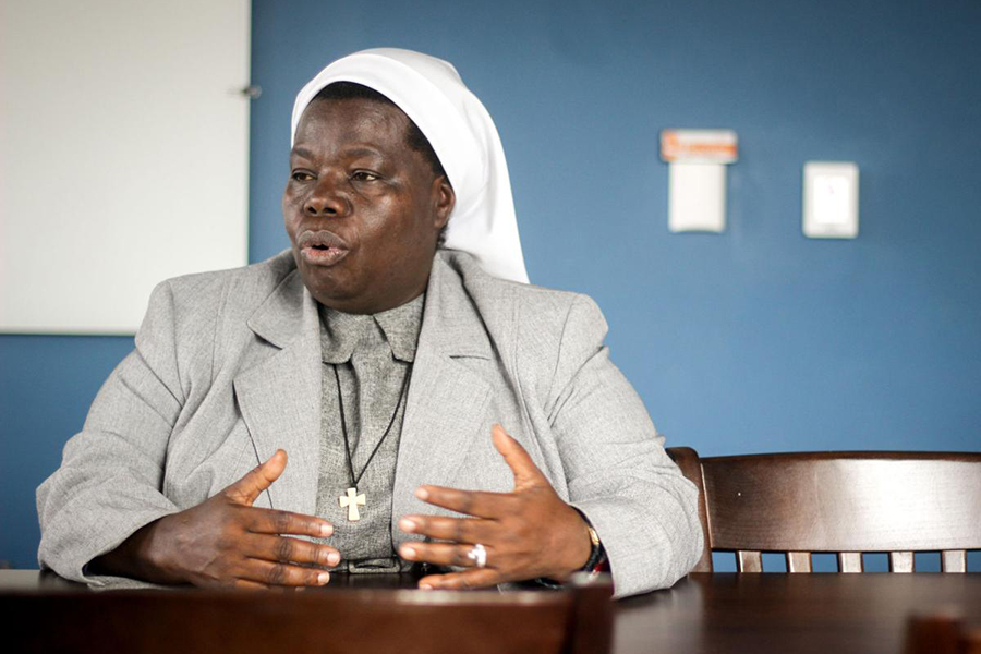 Sister Rosemary Nyirumbe speaks with reporters