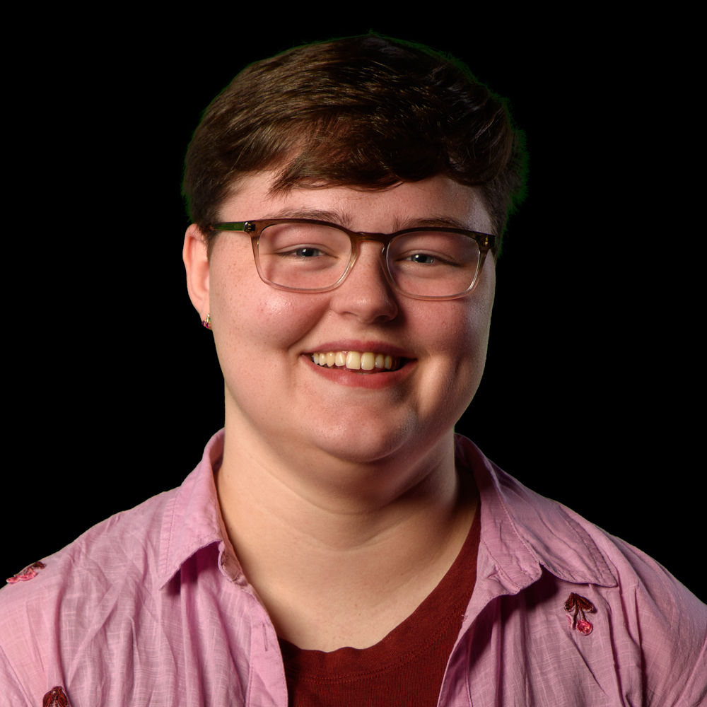 White silhouette icon on a dark grey background.