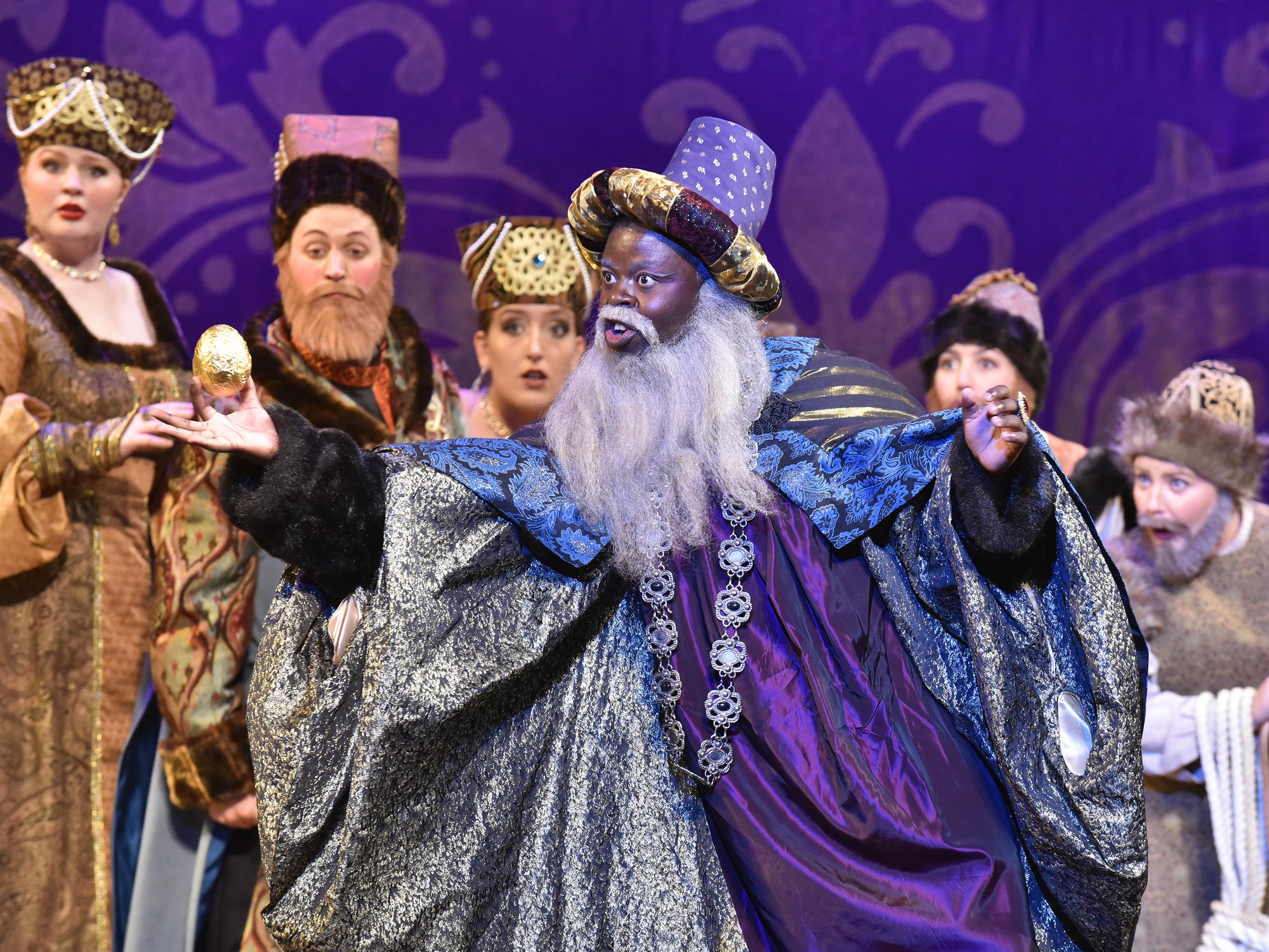 OU Opera Theatre Performance of Golden Cockerel - close up of wizard holding the egg.