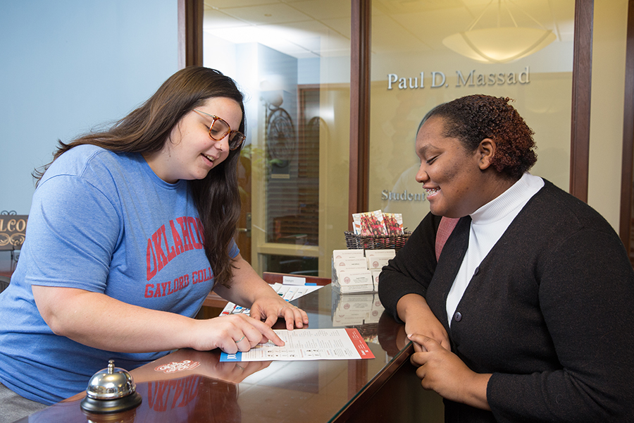 Students interacting with employer