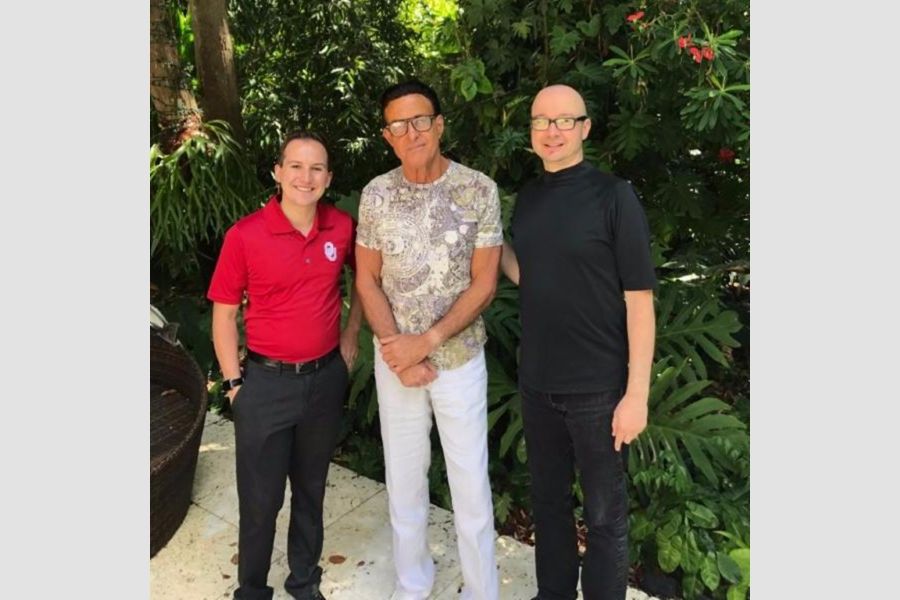 Chayo Frank with O U faculty.