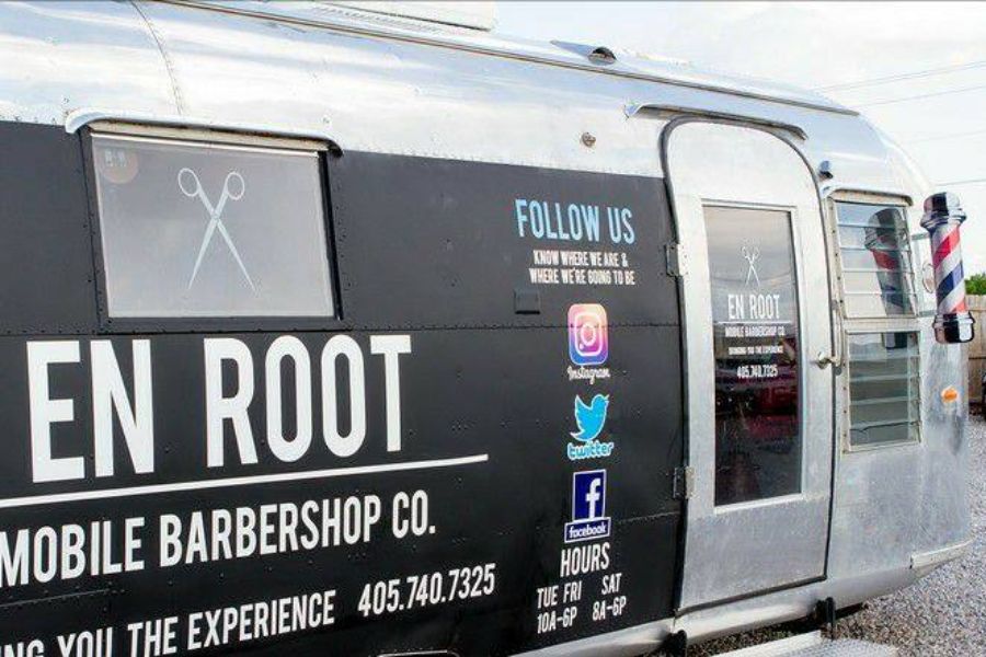 Picture of En Root mobile barbershop trailer.