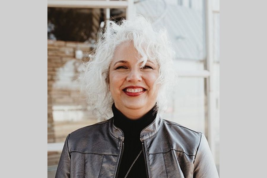 The late Lynne Rostochil standing for a portait