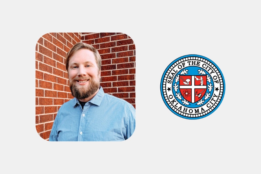 Landon Jones and the Seal of the City of Oklahoma City. 