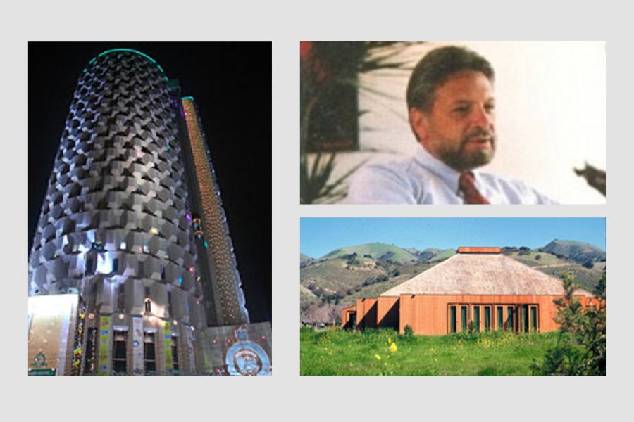 Michael D'Amico with photographs of buildings designed by his firm.