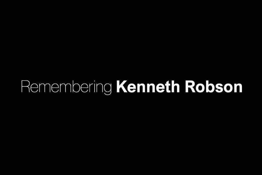 The text "Remembering Kenneth Robson" on a black background.