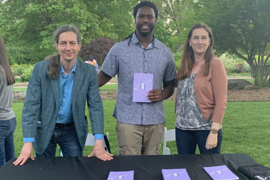 Nick LoLordo, Dimitri Washington, and Catherine Mintler on the lawn of the Philbrook Museum in Tulsa.