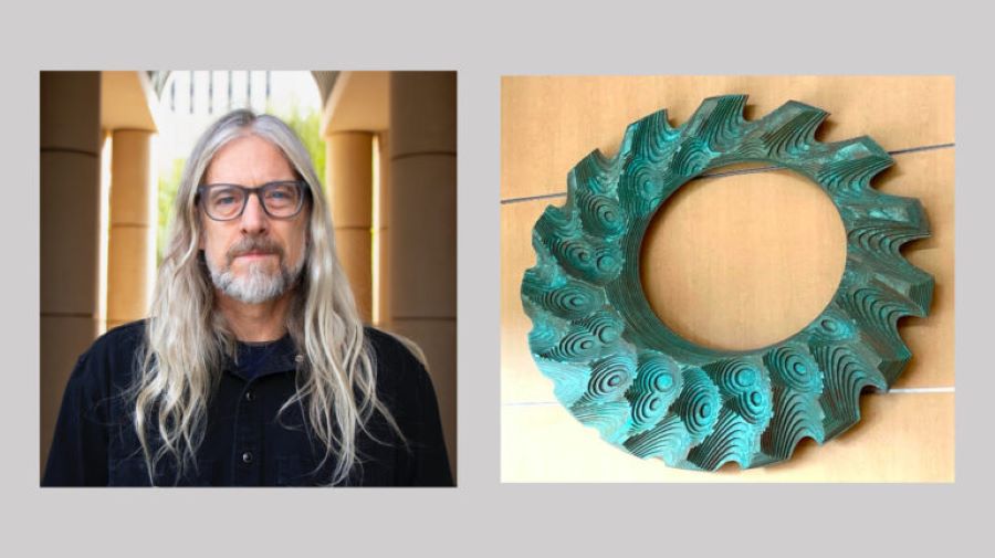 Chris Morrey with sculpture.