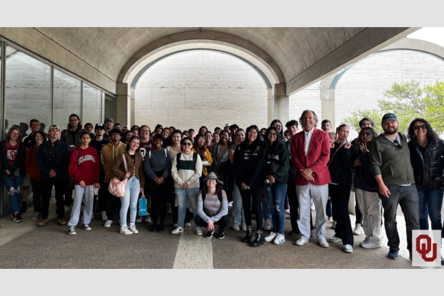 Architecture students and faculty standing grouped together.