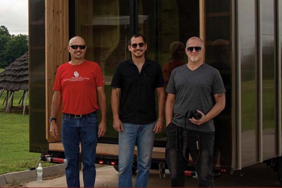 Jerry Puckett, Bryan Bloom and Ken Marold in front of a mobile medical unit.