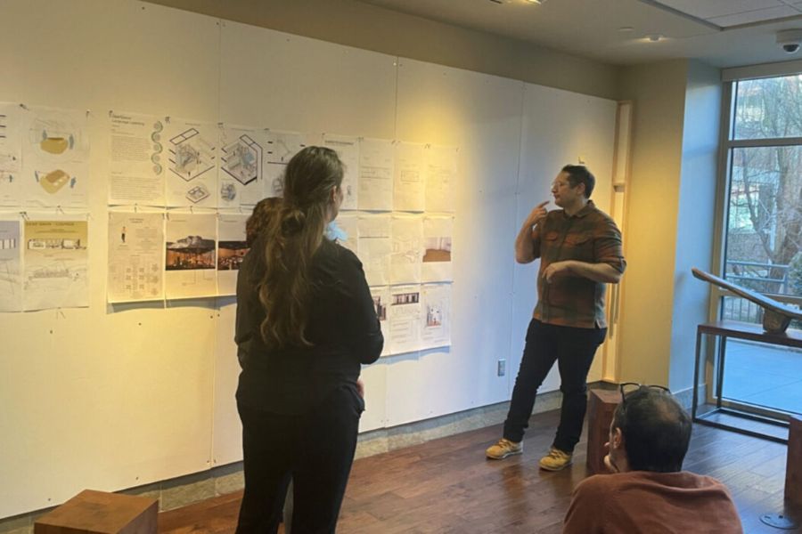 Jeffrey Mansfield critiques student designs.