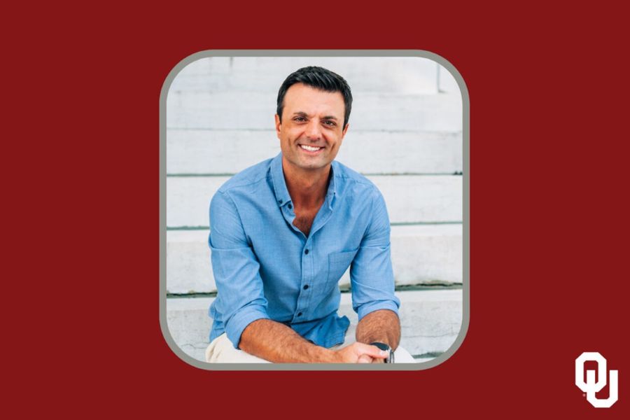 Zach Punnett with the O U logo.