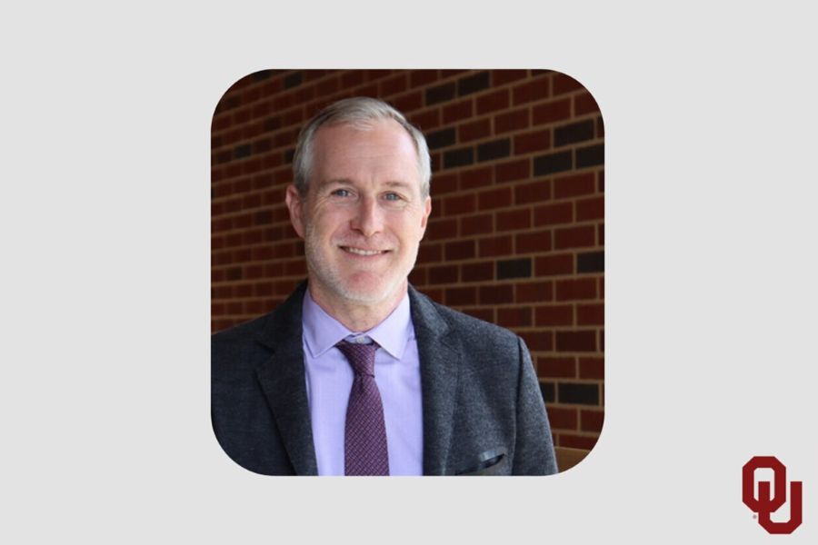 Bryce Lowery with the O U logo.