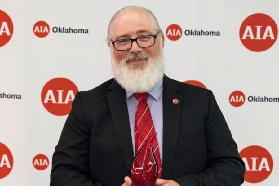 Daniel Butko with his award from A I A Oklahoma.