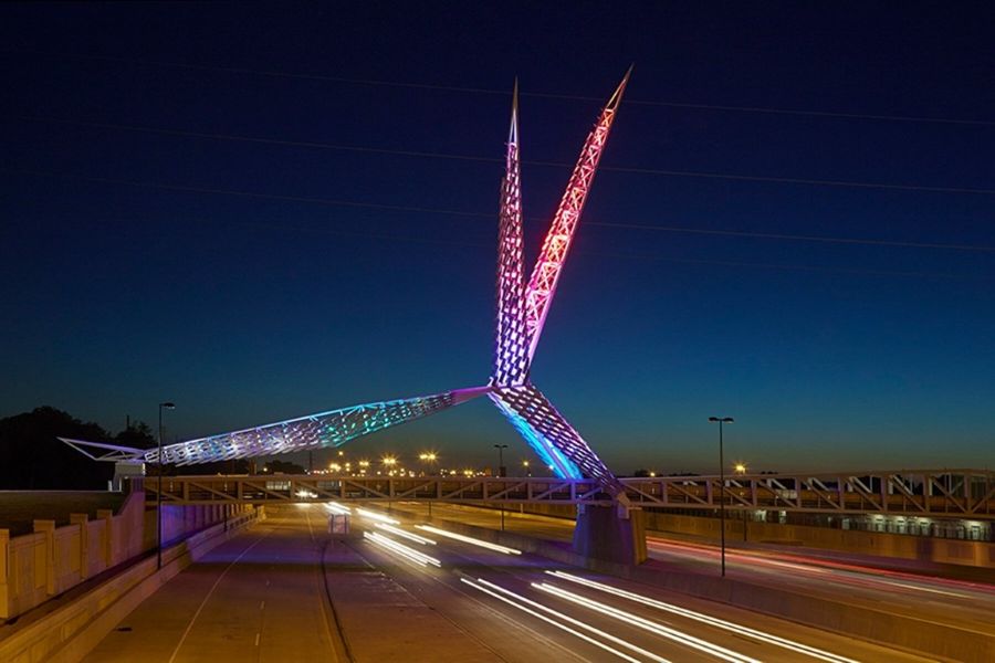 Skydance Bridge in Oklahoma City with nighttime illumination.