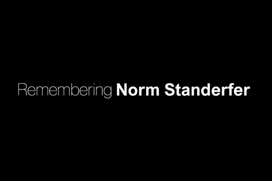 The text "Remembering Norm Standerfer" on a black background.