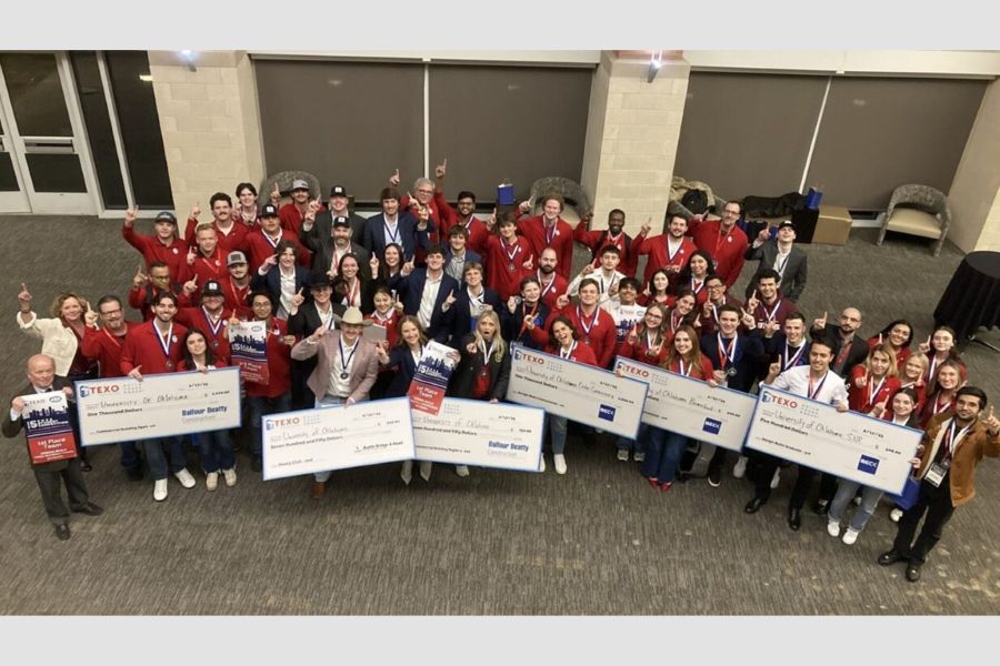 An aerial view of O U students with prize checks.