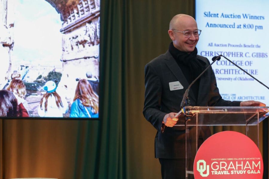 Gibbs College dean Hans E. Butzer speaks at the Graham travel study gala.