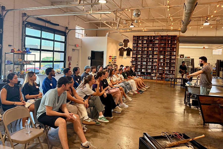 Students watching a presentation. 