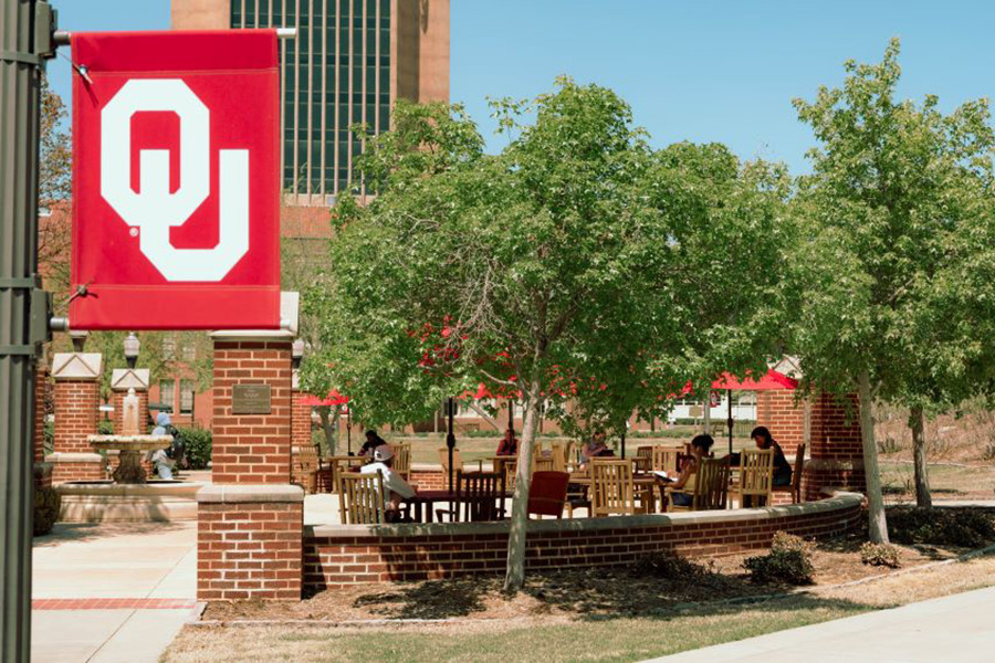 A sunny day at an outdoor patio area for students to study and relax on the west side of campus.