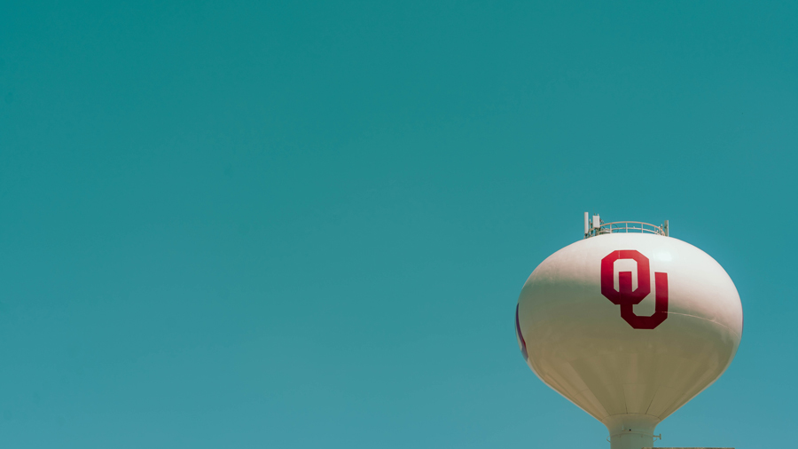 O-U water tower in the bottom right corner over a completely blue and cloudless sky.