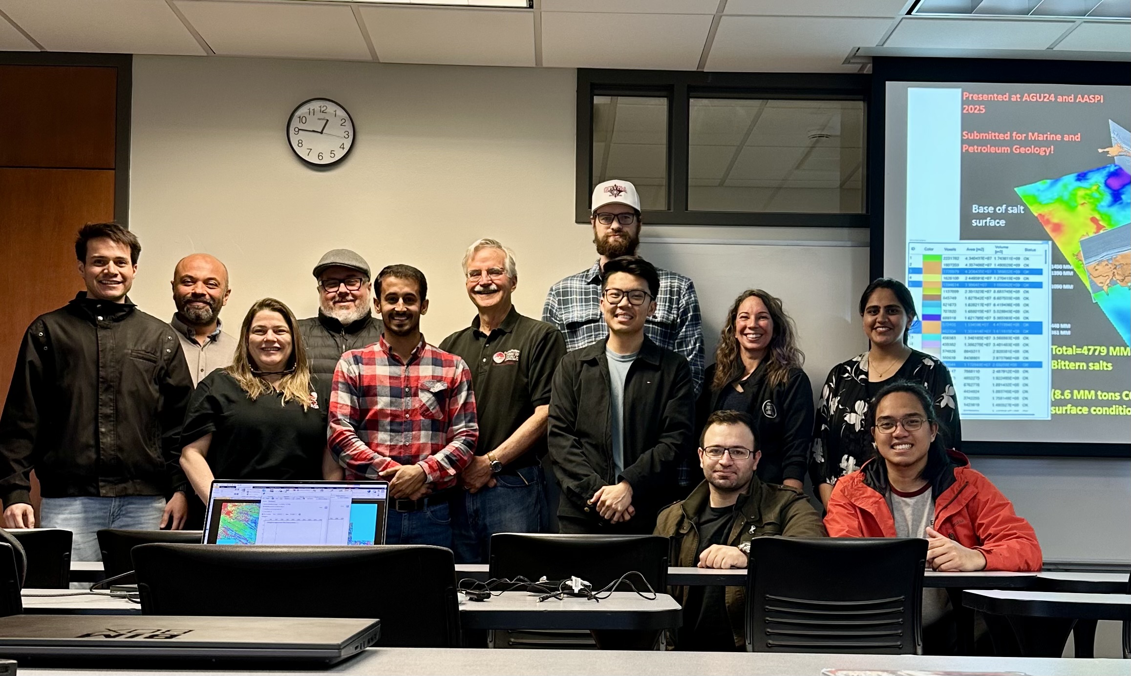 The AASPI group standing in a classroom.