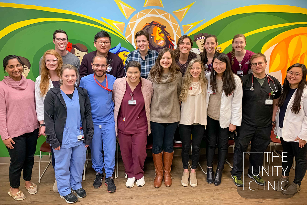 Representatives from the Unity Clinic executive team at Crossings Community Clinic Midtown.