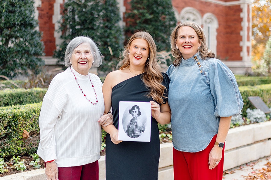 OU graduating senior Layne Keep (middle) poses with her mother, grandmother, and a photo of her great-grandmother who all graduated from OU.