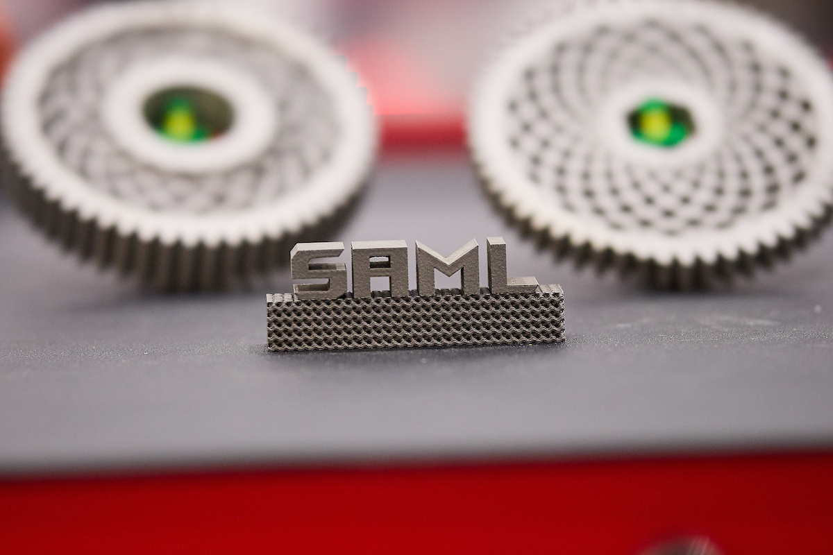 The letters SAML, 3D manufactured at the SAML.