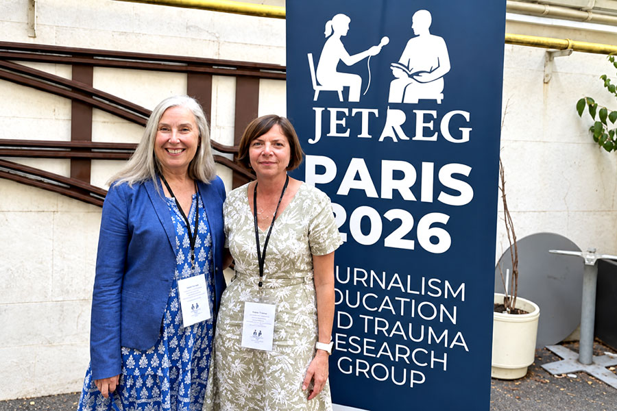 Two attendees of the Journalism Education and Trauma Research Group in Paris, France.