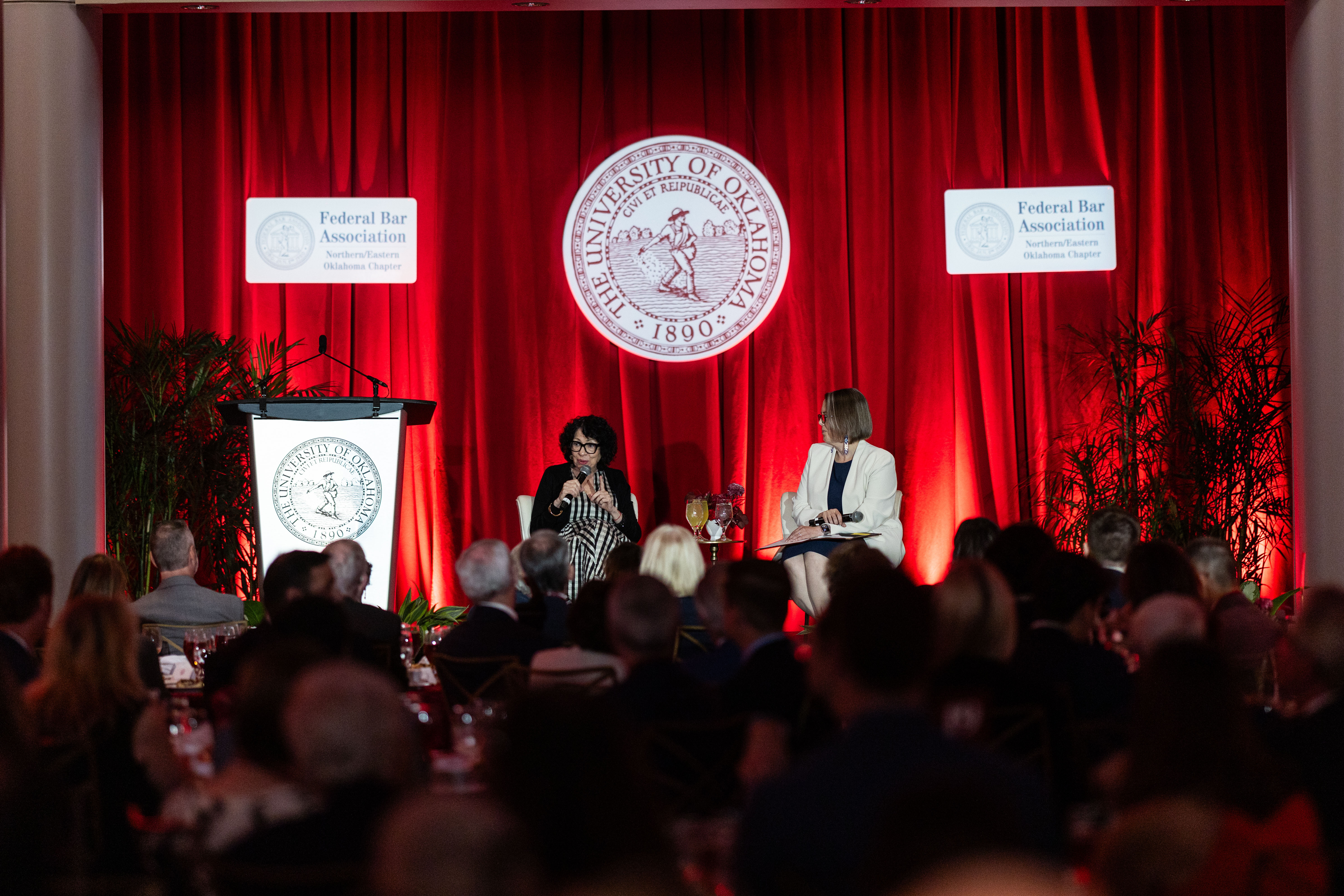 Supreme Court Justice Sotomayor and the Honorable Sara E. Hill seated on a stage.