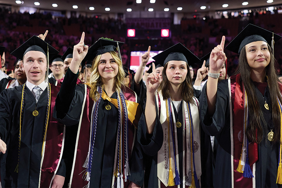 A large group of students in their graduation regalia.