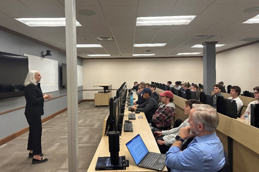 Cathy O'Conner speaks to a class of Real Estate students .