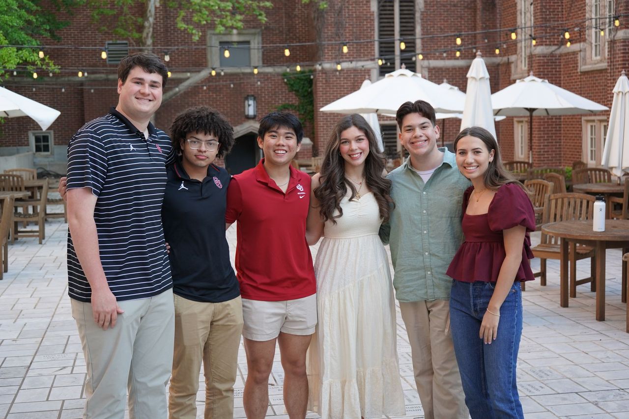 Six students in causal clothing.